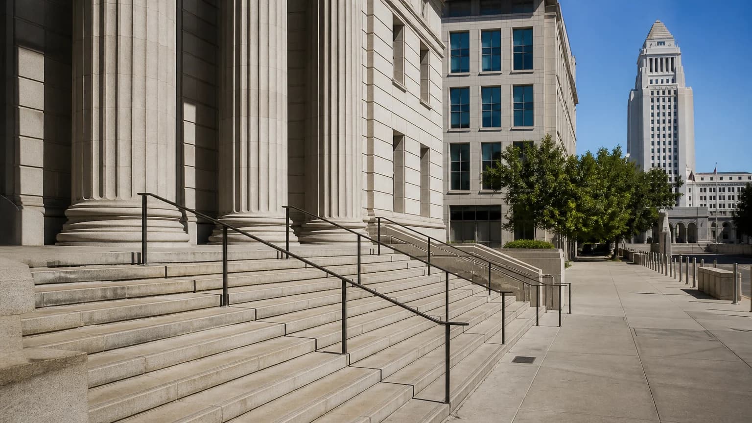 California Attorney Registry – two people reviewing printed business documents across a table in a bright downtown office