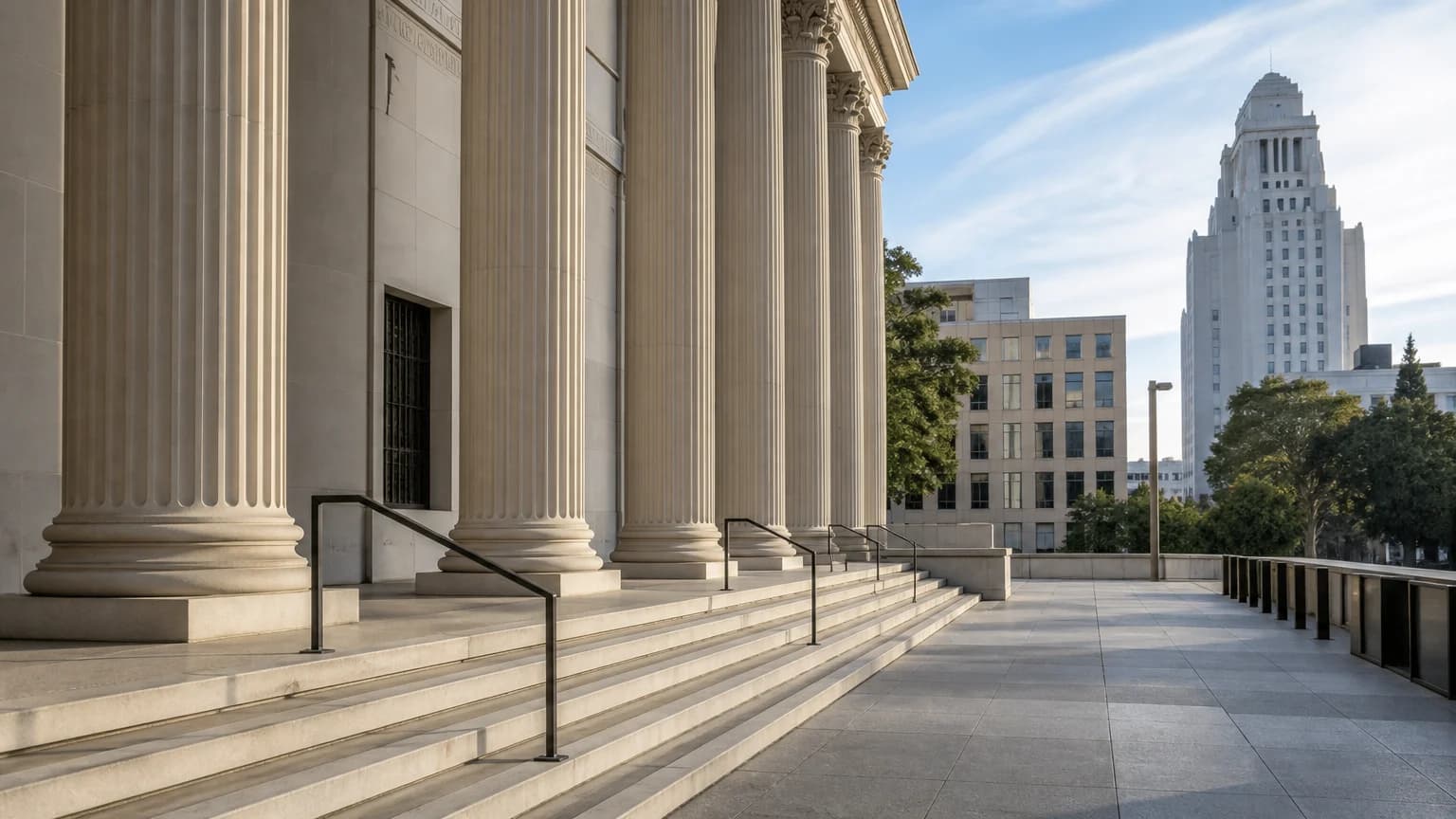 California Attorney Registry – marble courthouse steps under a clear sky with the California state flag flying