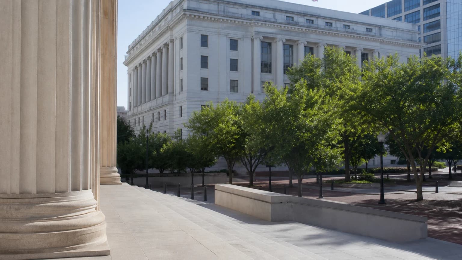 California Attorney Registry – wooden family courthouse doors with sunlight falling across the stone steps outside